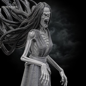 May include: A detailed, 3D printed sculpture of a skeletal female figure with long, flowing hair. The figure is depicted with a wide-open mouth, revealing sharp teeth, and a distressed expression. The sculpture is painted in shades of gray, creating a realistic and eerie effect.