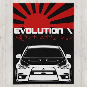 May include: A black and white illustration of a Mitsubishi Lancer Evolution X with the text "EVOLUTION X" and Japanese text "エボリューション" on a black background with a red rising sun graphic.
