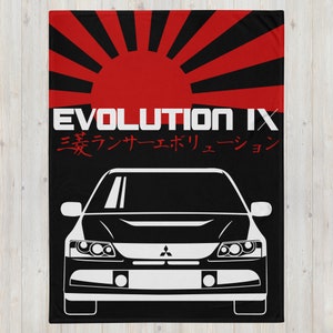 May include: Black and white illustration of a Mitsubishi Lancer Evolution IX with a red and black rising sun graphic behind it. The text "EVOLUTION IX" and Japanese text are above the car.