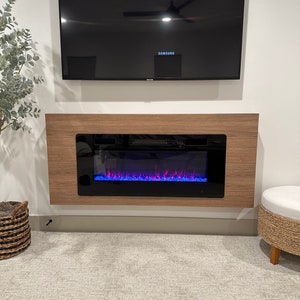 Chestnut Wood Grain - Floating Fireplace. Transform any room. Easily mount on your wall with 2 screws. Modern electric digital fireplaces.