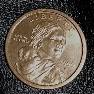 Sacagewea 2000 P minting errors wide rim and her eyes are offset