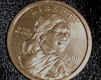 Sacagewea 2000 P minting errors wide rim and her eyes are offset