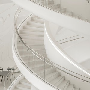 May include: A white spiral staircase with glass railings. The staircase is in a modern building with white walls.
