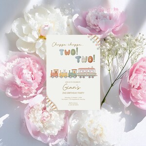 May include: A birthday party invitation with a train illustration and the text "Chugga chugga... TWO! TWO!" in pastel colors. The invitation also includes the name "Gian's" and party details. Surrounded by pink and white peonies.