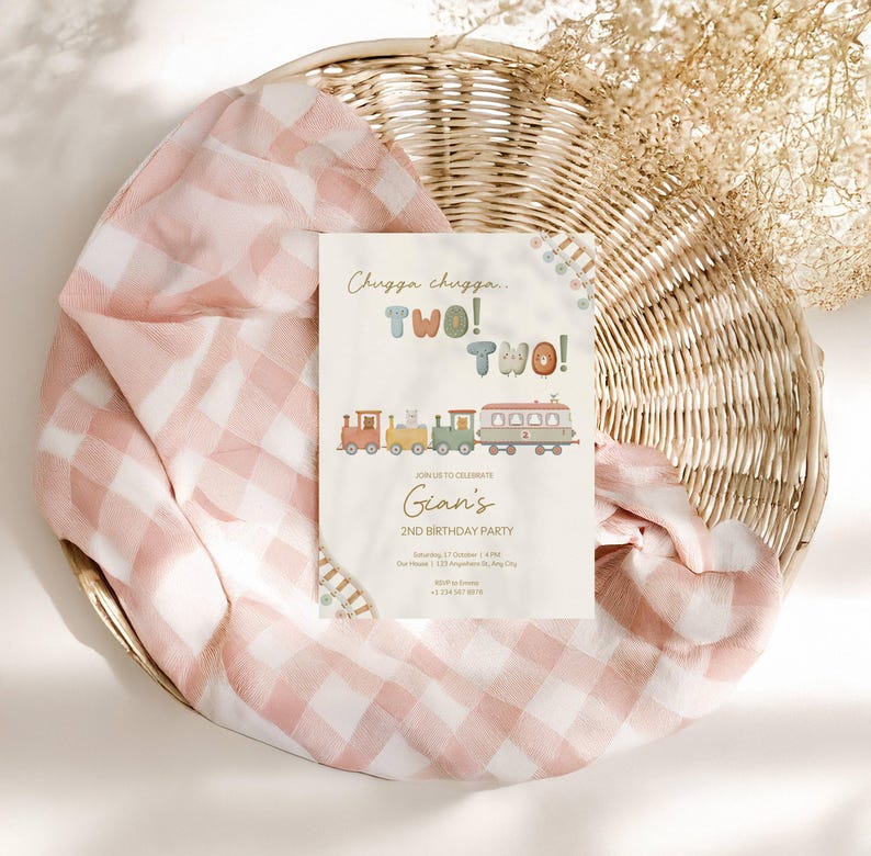 May include: A birthday party invitation with a train illustration. The invitation reads "Chugga chugga... TWO! TWO!" and "Join us to celebrate Gian's 2nd Birthday Party". The invitation is on a cream background with a colorful train design.