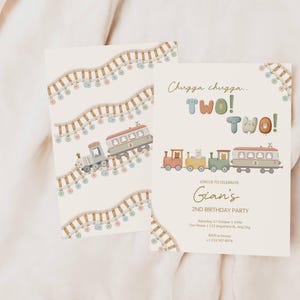 May include: Two birthday party invitations with a train theme. One invitation features a train on tracks with colorful lights. The other invitation says "Chugga chugga... TWO! TWO!" and includes a train illustration. The invitations are cream-colored.