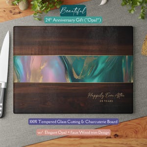 May include: A rectangular cutting board with a dark wood grain design. The center features a tempered glass section with teal, pink, and gold abstract art. Text reads "Beautiful 24th Anniversary Gift" and "Happily Ever After 24 Years".