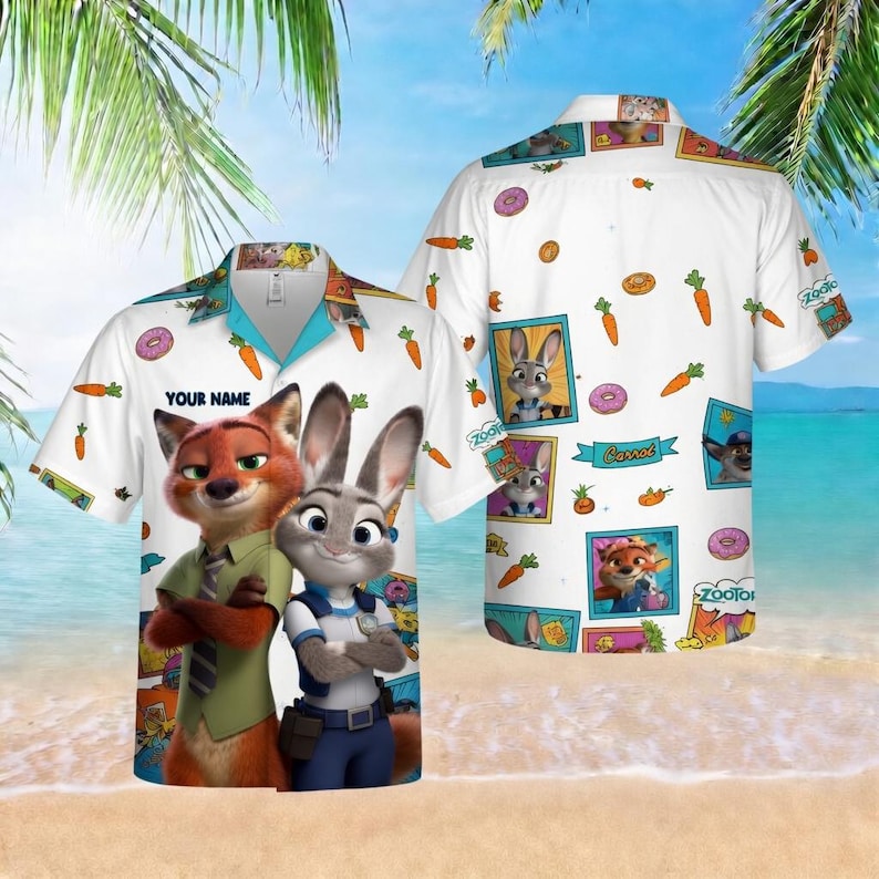 May include: White short-sleeved button-up shirt featuring cartoon characters from Zootopia. The shirt has a blue collar and is decorated with images of carrots, donuts, and characters. The text "YOUR NAME" is printed on the front.