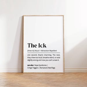 Puede incluir: Un póster de arte de pared imprimible con una definición de la palabra "ick" como repelente de atracción. El póster está en texto negro sobre un fondo blanco con un marco de madera.