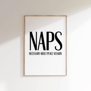 May include: A white framed print with black text that reads "NAPS Necessary Adult Peace Session".