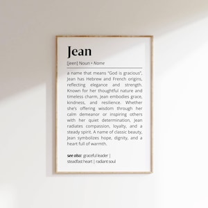 Pode incluir: Uma definição imprimível em preto e branco do nome Jean. A definição descreve o significado, a origem e as características do nome. Também inclui a frase "ver também: líder gracioso | coração firme | alma radiante".