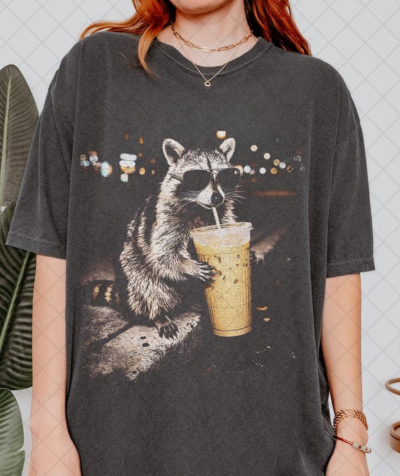 Comfort Colors Raccoon Drinking Iced Coffee Shirt, Funny Animal Meme Tee, Coffee Lover Raccoon Shirt, Gift For Women and Man Unisex T-Shirt