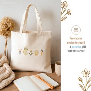 May include: Cream-colored tote bag with embroidered gardening tools and floral designs. The bag features a pair of shears, a watering can with flowers, a rose, a straw hat, and a trowel. Text on the right says "Free bonus design included - a surprise gift with this order!"