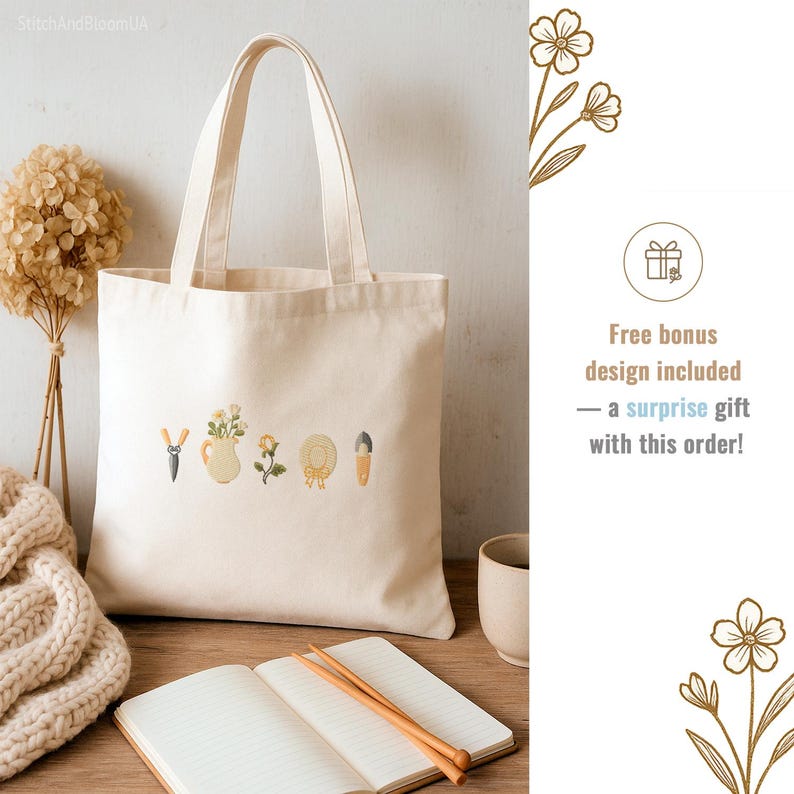 May include: Cream-colored tote bag with embroidered gardening tools and floral designs. The bag features a pair of shears, a watering can with flowers, a rose, a straw hat, and a trowel. Text on the right says "Free bonus design included - a surprise gift with this order!"
