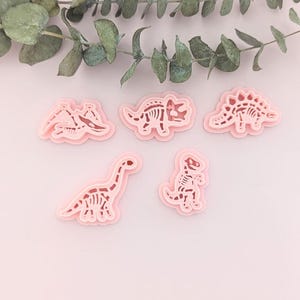 Cortadores de arcilla polimérica de fósiles de dinosaurio: pendientes, triceratops, T-Rex