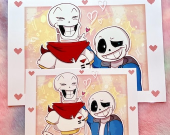 May include: Two framed prints featuring cartoon characters, one with a red scarf and the other in a blue jacket. The prints have a pink and yellow background with hearts and stars. The frames are white with pink heart accents.