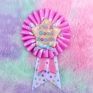 I’m A Good Noodle! award ribbon - one layer version // clowncore rosette ita bag decor party kei Pink