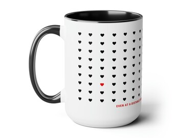 Hearts together. Love cup. Two-Tone Coffee Mugs, 15oz. Even at a distance our hearts always beat together.