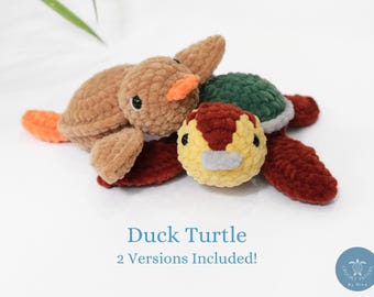 May include: Two crocheted plush toys, a brown duck and a red turtle with a green shell. The toys are made with a soft, fuzzy yarn. The text "Duck Turtle 2 Versions Included!" is printed below the toys.