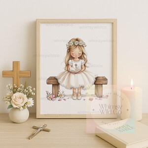 May include: A watercolor illustration of a young girl wearing a white dress and a flower crown, sitting on a wooden bench and reading a book. The girl is holding a book with a cross on the cover. The illustration is surrounded by a white frame and has the text "Whimsy Wild Co" at the bottom.