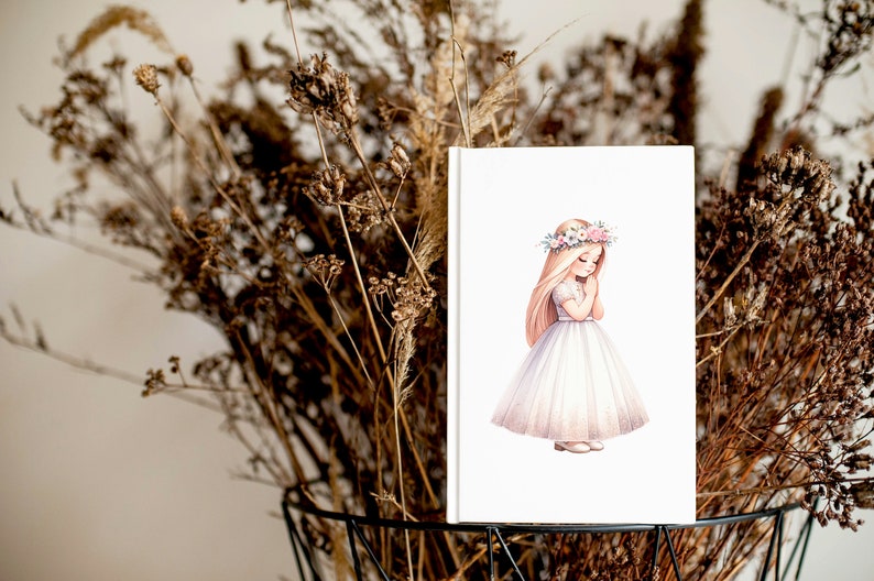 May include: A white card with a watercolor illustration of a girl in a white dress and a flower crown. The girl is holding her hands together in a prayer position.