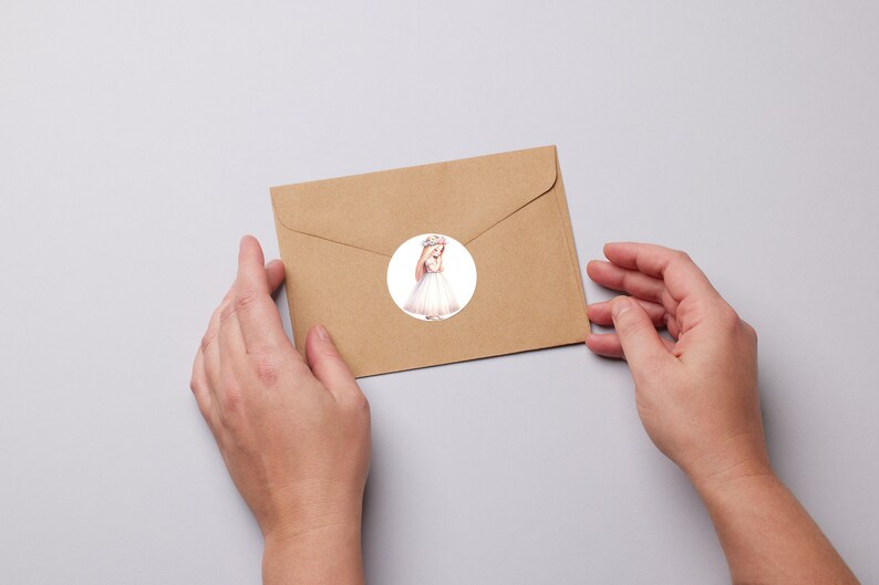 May include: A brown paper envelope with a round sticker featuring a watercolor illustration of a girl wearing a white dress and a flower crown.