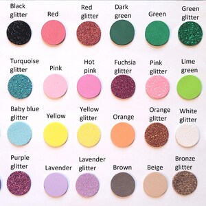 May include: A chart of 24 different colors of glitter, including black, red, green, gold, silver, turquoise, hot pink, fuchsia, pink, lime green, blue, baby blue, yellow, orange, white, purple, lavender, brown, beige, bronze, and rose gold.