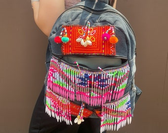 Artisan Embroidered Backpack: Handcrafted Statement Piece for Style and Functionality  Eye-catching design