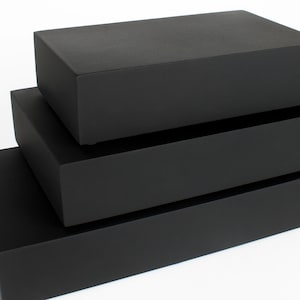 Matte black display base. MDF wood stand for figurines, decorations, and collectibles. 5x20 cm panoramic platform, 3 cm height. Long format.