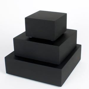 MDF wooden base for figures. Black base for miniatures, scenery, and collectibles. Black stand for exhibition and decoration. Square format.