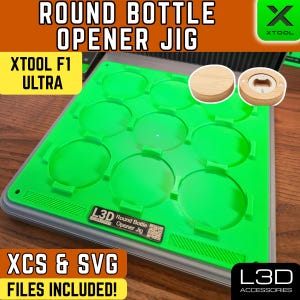 May include: A green jig for round bottle openers with the text "ROUND BOTTLE OPENER JIG" and "XTOOL F1 ULTRA". Includes XCS & SVG files. Features a wooden bottle opener and a wooden disc. The L3D Accessories logo is visible.