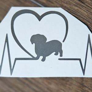 Mooie sticker hartslag hond/teckel