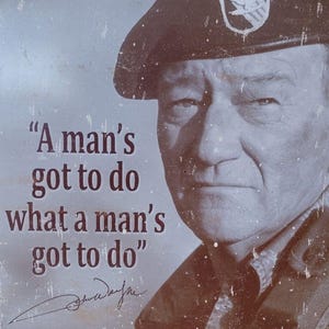 Vintage John Wayne picture on tin