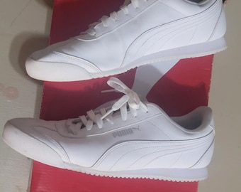 Zapatillas Puma híbridas de caña baja, blancas, con plantilla SoftFoam y tecnología Ultra Comfort. Talla 10 de hombre.