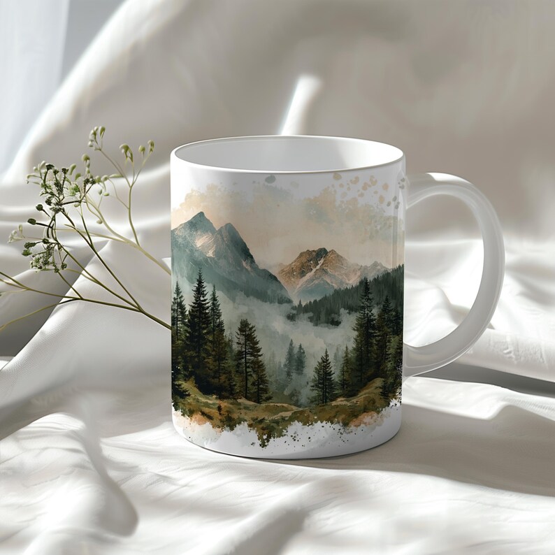 a coffee mug with a painting of a mountain scene