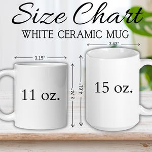 two white ceramic mugs with measurements on them