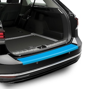 May include: A black car's rear bumper with a bright blue protective strip. The bumper has a silver trim and two small black sensors. The car's trunk is open, revealing a black interior.