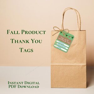 May include: A brown paper bag with a green and brown thank you tag attached. The tag says "Thank you for supporting our troop!" and has a list of names and a number. The text "FALL PRODUCT THANK YOU TAGS" is written in green text on a white background.