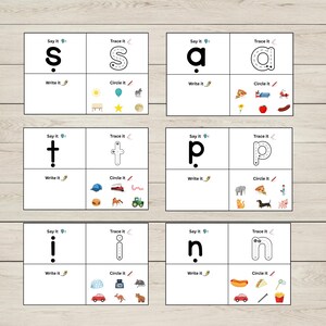 May include: Six educational worksheets featuring letters s, a, t, p, i, and n. Each card includes sections labeled Say it, Trace it, Write it, and Circle it with various colorful illustrations like a sun, pizza, train, and animals for letter recognition.