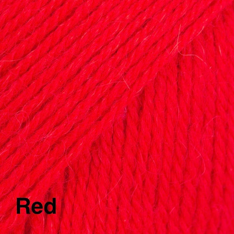 May include: A vibrant red yarn with a visible twisted fibre texture. The strands are arranged in parallel lines, showcasing the consistent thickness and bright solid colour of the material. The word Red is printed in black in the bottom corner.
