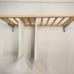 Tendedero de ropa plegable de pared que ahorra espacio