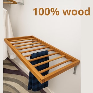 Tendedero de ropa plegable de pared que ahorra espacio