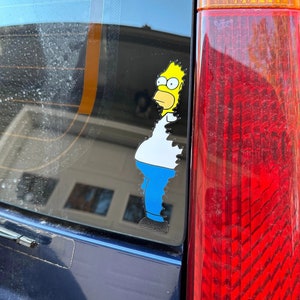 sticker applied to a car window