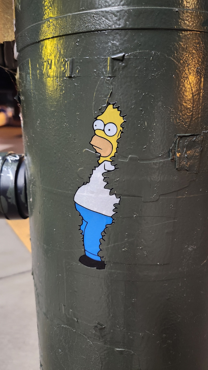 Waterproof Homer decal on a light pole