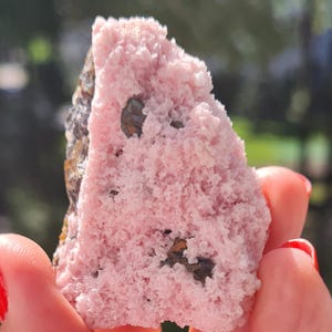 Well-formed, brilliant pink Rhodochrosite specimen from Cavnic, Romania.