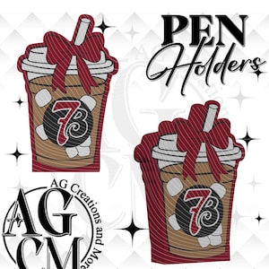 May include: Two pen holders shaped like coffee cups, with a maroon bow and a straw. The cups are brown with white marshmallows and the number 73. The text "PEN Holders" is above the cups, and the logo "AG Creations and More" is below.