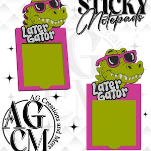May include: Two sticky notepads with a cartoon alligator wearing pink sunglasses. The alligator is green and the notepads are pink with a green interior. The text "Later Gator" is above the notepad. The words "Sticky Notepads" are in cursive.