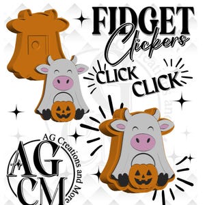 May include: Two fidget clickers shaped like cows wearing ghost costumes and holding orange jack-o'-lanterns. The text reads FIDGET Clickers, CLICK CLICK, and AG Creations and More. The cow figures are gray with pink ears and noses.