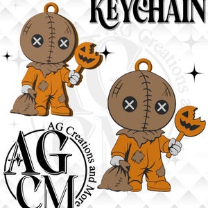 May include: A keychain design featuring a cartoon character with a burlap sack head, button eyes, and stitched details, wearing an orange jumpsuit with patches. The character holds a bitten pumpkin lollipop and a brown sack. Text reads KEYCHAIN.