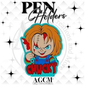 May include: A pen holder featuring a cartoon illustration of a doll with orange hair, blue eyes, and a stitched face, wearing blue overalls and holding a knife with red blood splatter. The text reads PEN Holders and CHUCKY in red letters.